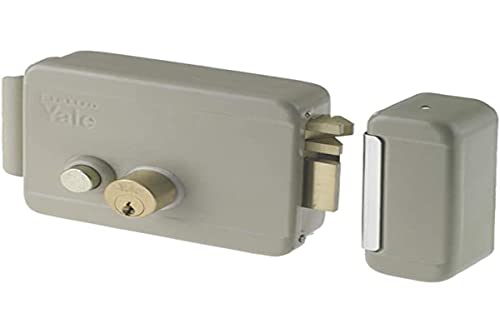 Cerradura eléctrica de sobreponer para puertas Art. 688 con pestillo azionabile retraído externo mediante llave, desde interior mediante botón, a distancia mediante impulso eléctrico de bajo voltaje (10 W-12 V). Acabado Acero Barnizado. controbocchetta incl